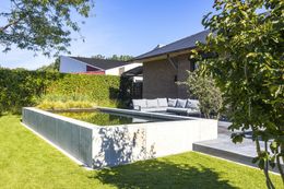 Foto van een recent zwemvijverproject van Poels